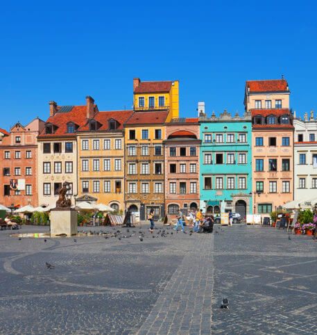 Colourful buildings in front of a square in Poland. Poland holidays and vacations package.