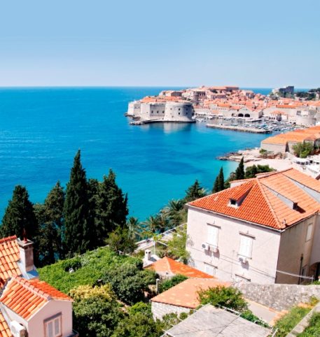 Traditional houses overlooking the crystal clear sea. Homeric tours offer many holiday packages.