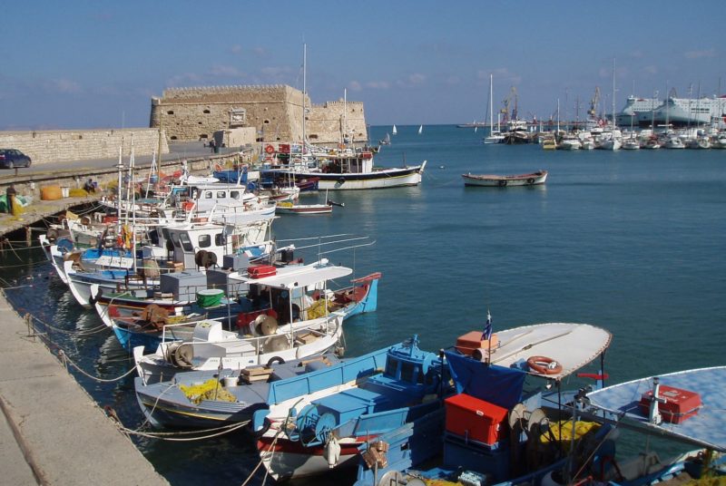 Fish boats and yachts at the port of Rhodes Town, one of the destinations Homeric Islander D package